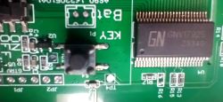 GNV1792S chip and push button on a green circuit board