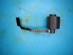 Black camera module with ribbon cable on a blue background