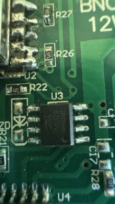Close-up of a circuit board with visible electronic components and traces.