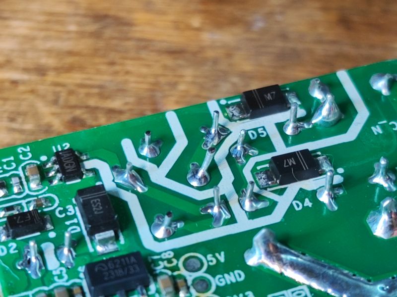 PCB of Sonoff ZBMini Device Close-up view of the PCB of the Sonoff ZBMini device with electronic components.