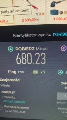 Test prędkości internetu pokazujący pobieranie 680,23 Mbps z routerem ZTE MC888 Pro Plus i kartą Orange.