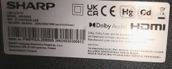 Etykieta znamionowa telewizora Sharp z modelem 40FG4EA, kodem kreskowym i logotypami HDMI oraz Dolby Audio