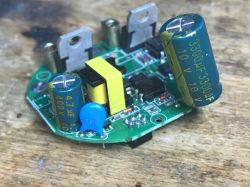 Printed Circuit Board of Appio 9605 Switch Module Printed circuit board with electronic components, including capacitors and connectors.
