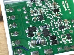 Close-up of the PCB of the WSM16-W1 module showing electronic components.
