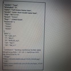 Photo showing a display with a configuration code for an electronic device.