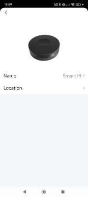 Black, round device labeled Smart IR displayed on a phone screen.