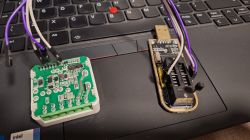Electronic measurement devices on a laptop keyboard.
