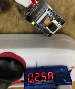 Powered ESP32-Cam with Current Measurement ESP32-Cam connected to power with a display showing 0.25A