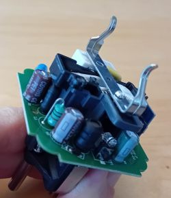 Interior of Action Smartplug with BKN7231N Chip Interior of a smartplug with components on a PCB