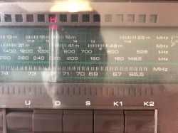 Front of Unitra Sudety R-208 Radio Frequency scale of Unitra Sudety R-208 radio with AM and FM bands.