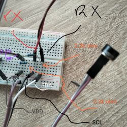 Close-up of a breadboard with connected wires and resistors.