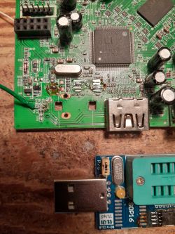 PCB with electronic components and USB adapter for flash memory programming