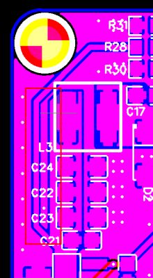 Section of PCB design with components and traces.