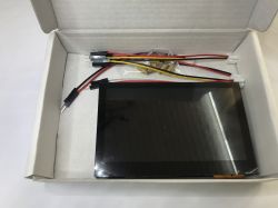 ESP32-S3 Touch LCD 4.3-inch in packaging ESP32-S3 Touch LCD 4.3-inch module and power cables in a white cardboard box.