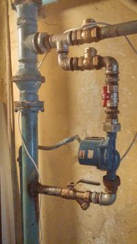 connection of the condensing furnace to the old installation with a plate heat e