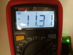 UNI-T UT33D+ multimeter display showing a DC voltage of 11.31 V.