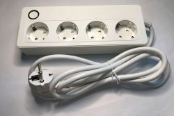 White power strip with four 230V sockets and long cord with plug