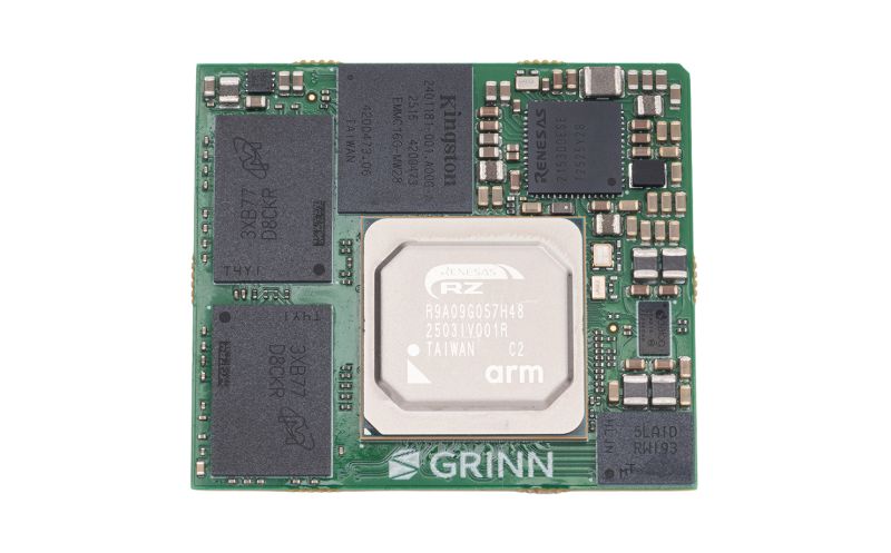 GRINN computer module with a Renesas RZ chip and several memory ICs on a green PCB