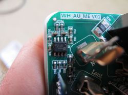 Printed Circuit Board with Electronic Components Close-up of a printed circuit board with electronic components and the label WH_AU_ME V01.