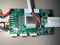 Printed circuit board with attached colored wires and connectors, visible RGB markings.