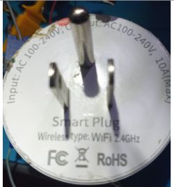 Smart plug with technical specifications and certifications on the casing.