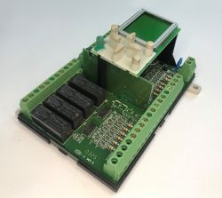 The interior of an old Schneider Electric SR1 A201BD programmable logic controller