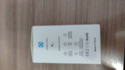 Back of white box with Amazon Alexa and Google Assistant logos