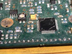 Close-up of a damaged PCB from a Garrett Ace 250 metal detector.
