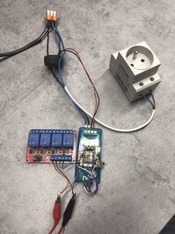 Prototype System for Heater Control with ESP8266 Module ESP8266 module with relay module and wiring.