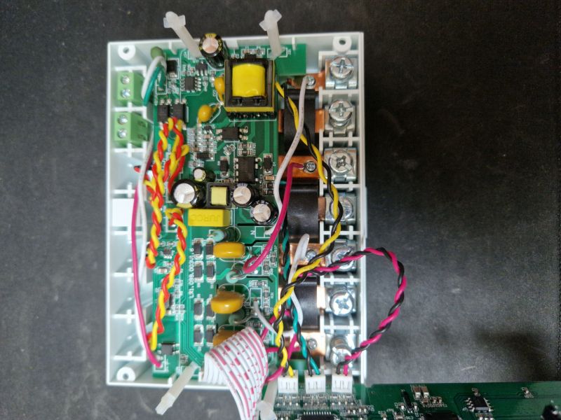 Interior of a Three-Phase Energy Meter Interior of a three-phase energy meter with electronic components on the board.