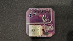 Purple PCB with Wi-Fi module and surface-mounted components