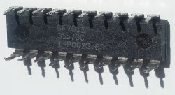 Black DIP microprocessor with alphanumeric markings on the top surface.