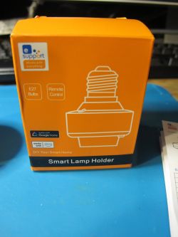 Orange box with a smart E27 lamp holder.