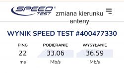 Wyniki testu prędkości internetu z pingiem 22 ms, pobieraniem 33.06 Mb/s i wysyłaniem 36.59 Mb/s.