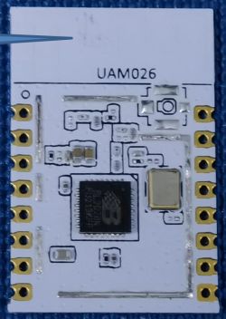 Electronic module UAM026 with visible components and circuit board.