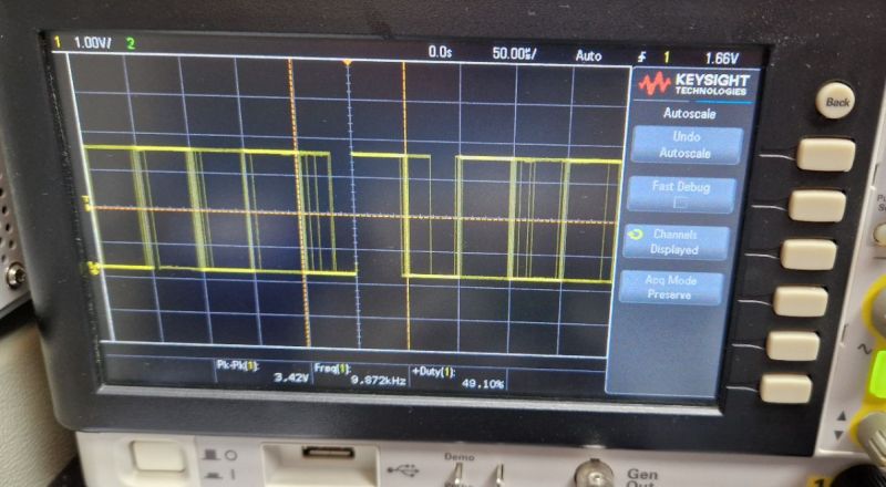 9.872 kHz Signal Measurement on Keysight Oscilloscope 9.872 kHz waveform with 49.10% duty cycle on Keysight oscilloscope screen