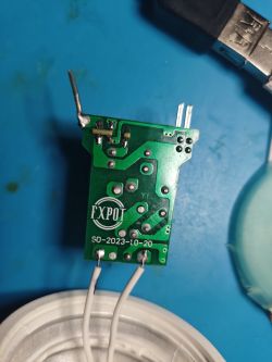 Circuit Board with Electronic Components Small green circuit board with several electronic components and soldered wires.