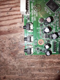 PCB fragment with TXD and RXD markings near vertically aligned jack sockets