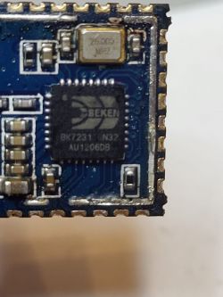 Close-up of an electronic module featuring a BEKEN BK7231 integrated circuit.