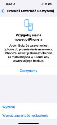 Zrzut ekranu menu iPhone z opcjami przeniesienia lub wyzerowania zawartości.