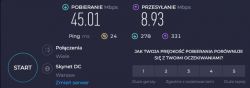 Zrzut ekranu z aplikacji Speedtest pokazujący prędkość pobierania i wysyłania.