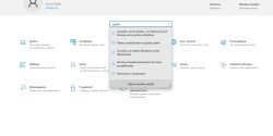 Okno Ustawienia Windows z wyszukiwaniem „system” i listą wyników w centrum