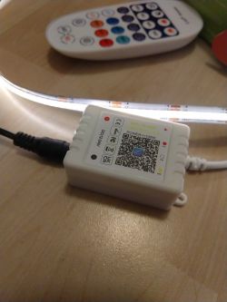 LED Controller with Remote LED controller with remote on a table.