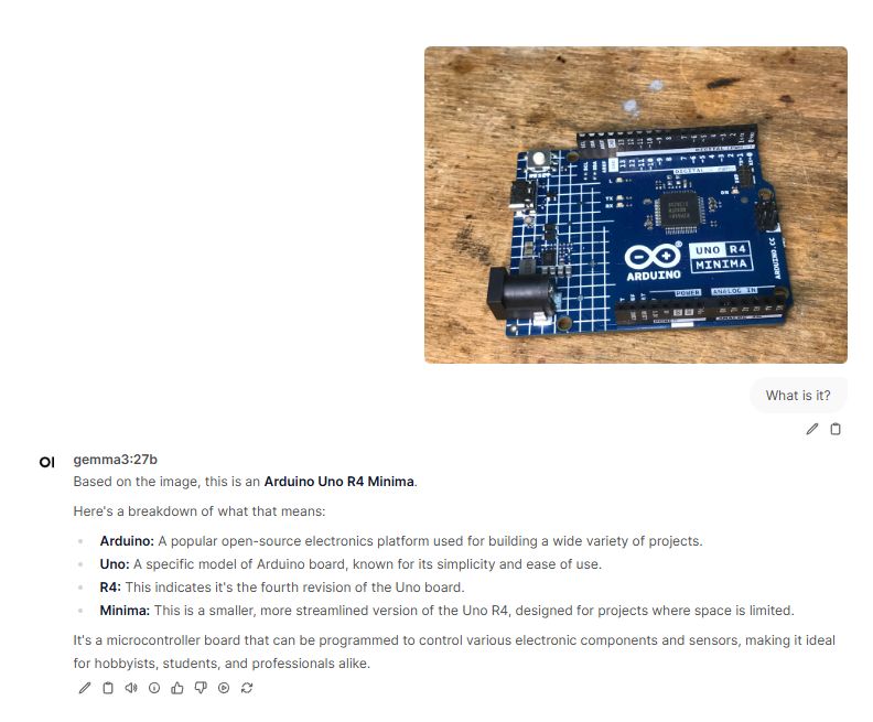 Arduino Uno R4 Minima Arduino Uno R4 Minima board on a wooden background.