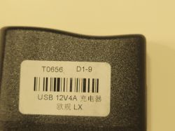 Product label with the text USB 12V4A on a black surface.