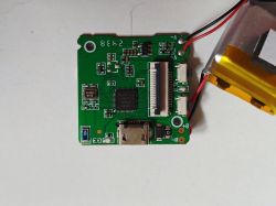 Electronic circuit board with battery Printed circuit board with electronic components and a connected lithium-polymer battery.