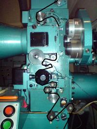 Zakładanie taśmy filmowej 35mm na projektor Prexer AP-62X