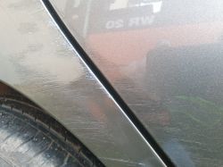 Niebieski nalot po zaprawce na nadkole - czy sam zejdzie czy trzeba poprawić polerowanie?