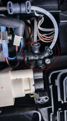 Interior of a Nivona 758 coffee machine with a valve highlighted.