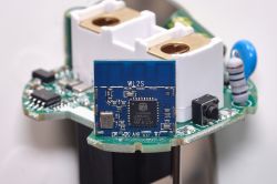 Close-up of an electronic module WL2S mounted on a printed circuit board.